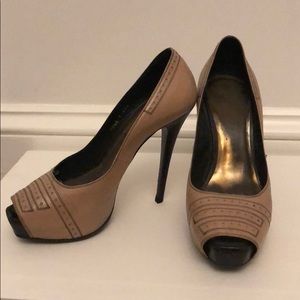 Italian made very high peep toe pumps